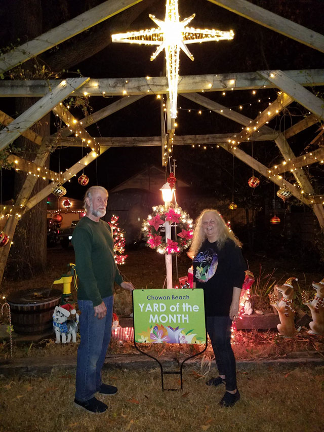 Image of 204 Chowan Trail with owners - Diane and Arthur Swanner - Christmas (December) 2021 Yard of the Month